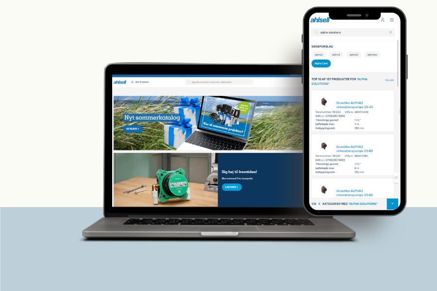 Screenshots af Ahlsells website på desktop og mobil
